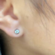 14 Karat White Gold Bezel Set Stud Earrings With 0.29Tw Round Diamonds